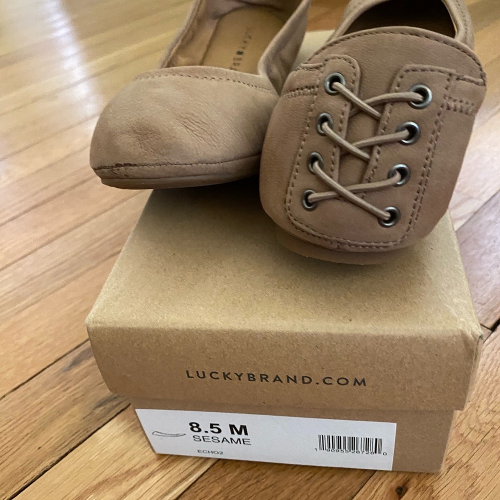 Light suede flat shoes.